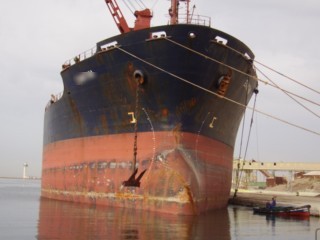 Sugar vessel alongside the quay.